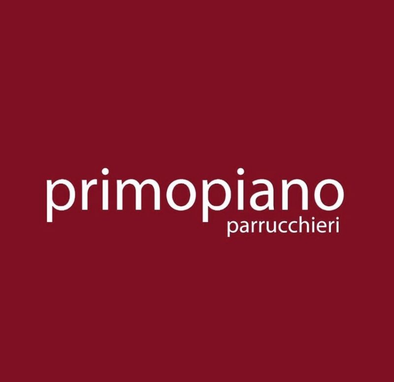 Brand Building per Primo Piano Parrucchieri. Logo bianco su sfondo rosso